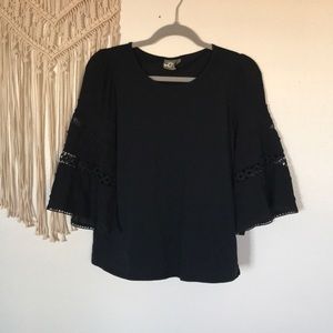 Anthropologie shirt with boho knit sleeves